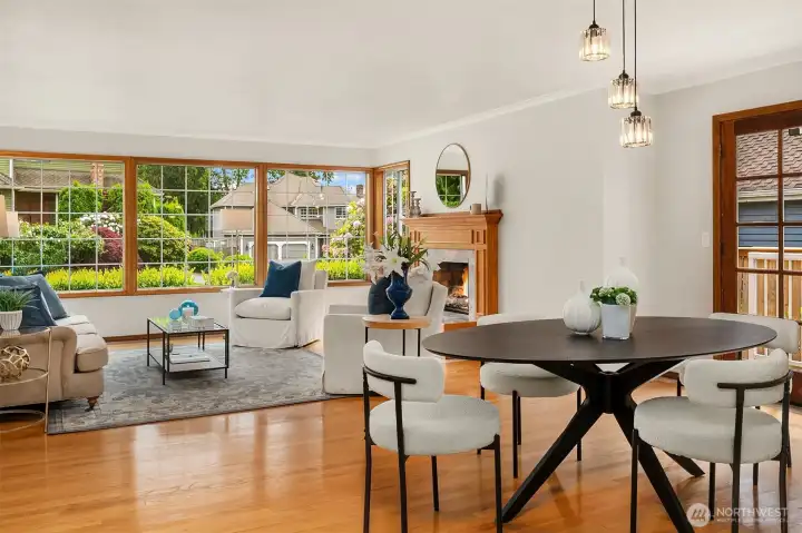 Open Floor Plan - Living Room to Dining Room - Atrium Doors Lead Out to West Facing Deck - Gas Fireplace