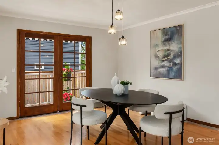 Spacious Dining Room - Can Support a 12 Placeset Dining Room Table - Double Atrium Doors Lead to West Facing Deck