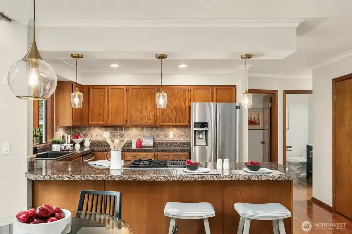 Neat and Tidy, Chef's Kitchen with Breakfast Bar and Stainless Steel Appliances
