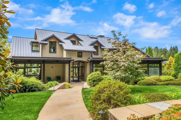Set on .7+ acres with 110' of pristine, protected shoreline in coveted Fletcher Landing.