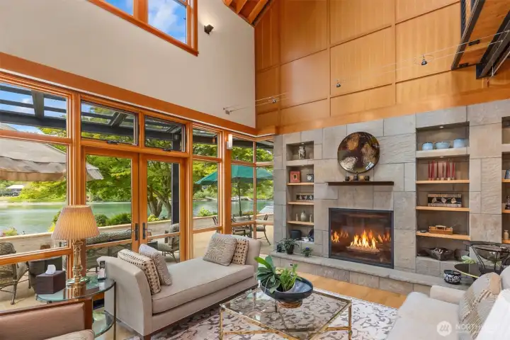 A mixture of solid and soft, volume and intimacy, vertical grain fir and hard rock surfaces. The living room, with French doors to the steel and glass covered waterside patio marries the interior to some of the island's most beauitful natural offerings, Fletcher Landing.