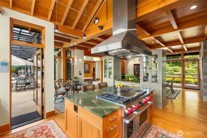 Multiple doors to the glass, steel covered stone patio for ease of living!