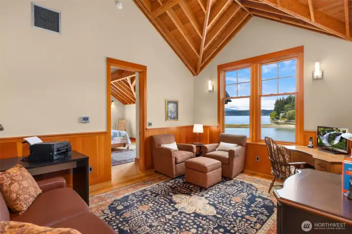 The upper study. View to the second bedroom suite. All bedrooms are ensuite! Every door in the home is vertical grain fir two panel - two inch thick, 8' sold core!