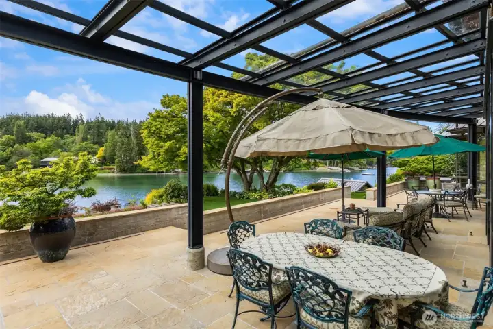 Steel, stone, glass and water! Seamless indoor/outdoor living!