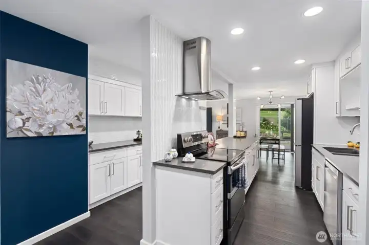 Great layout! Avoid bottlenecking in the kitchen with great hallway walkaround