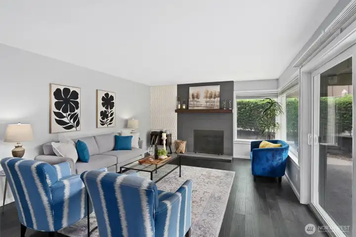 Modern fireplace surround and textured wall add character to the living space