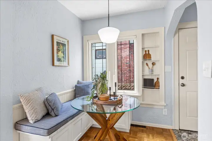 Built in seating with storage.  Door leads to the backyard deck.