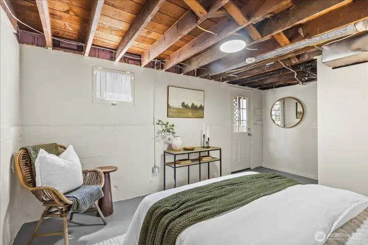 Lower level bedroom features exterior door.  Maybe an Air BnB??