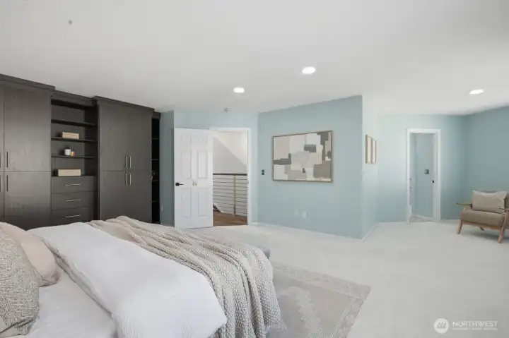 Primary suite with beautiful custom floor-to-ceiling built-in cabinetry. Primary suite with beautiful custom floor-to-ceiling built-in cabinetry.