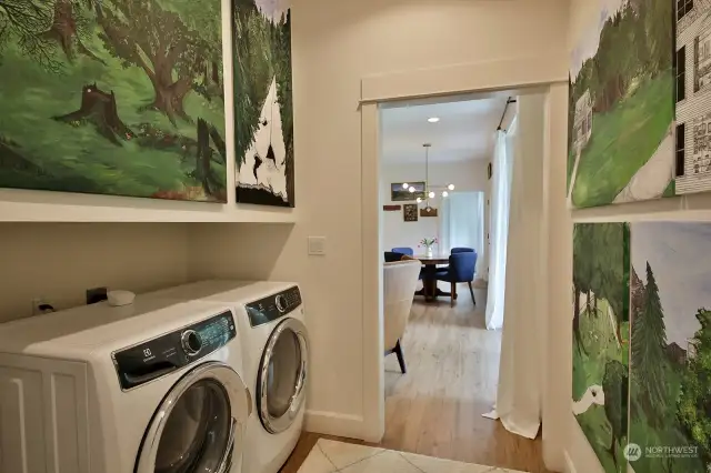 Second laundry room that you walk through to access the second lower level bedroom.