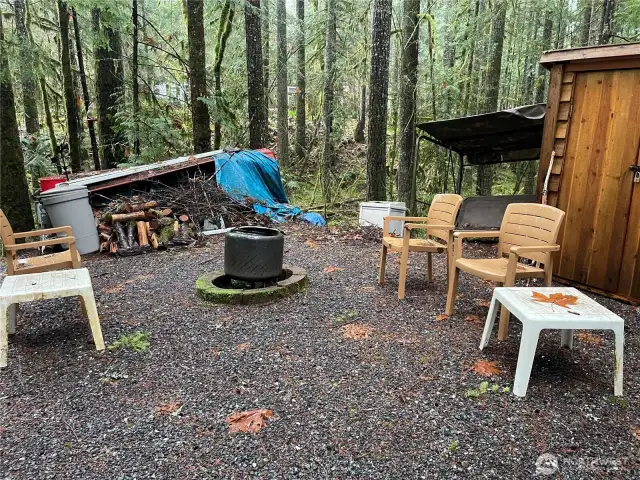 Fire pit area backs up to expansive greenbelt