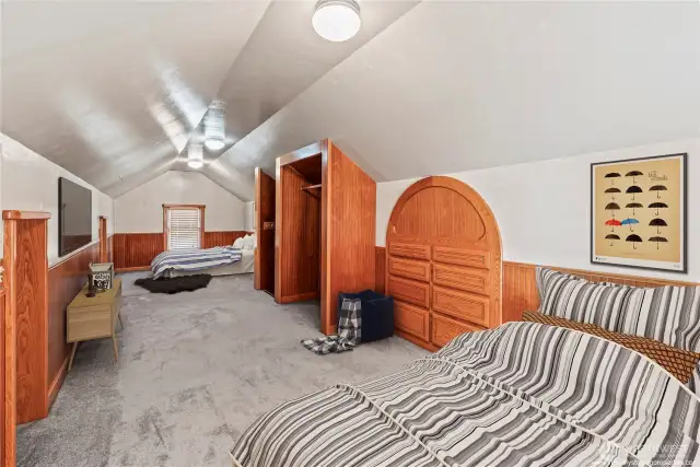 Upper attic retreat. Note: virtually staged