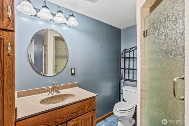 Lower level three-quarter bathroom