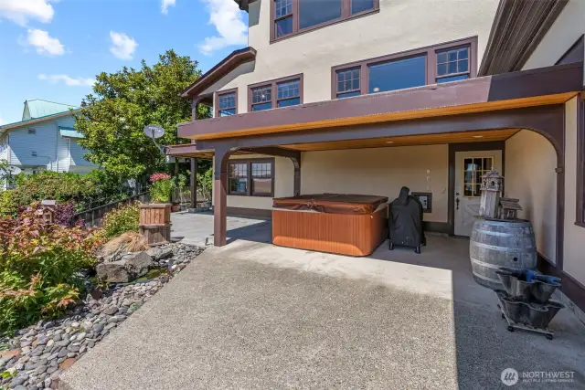 Lower level entry and covered hot tub for year round relaxation