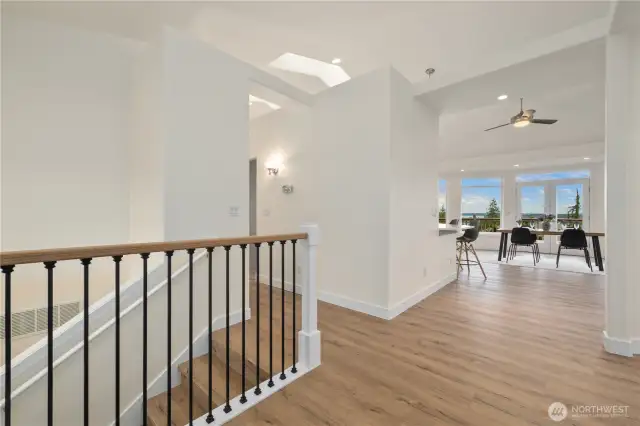 Entryway leading to living area and basement (1/2 bath to the right)