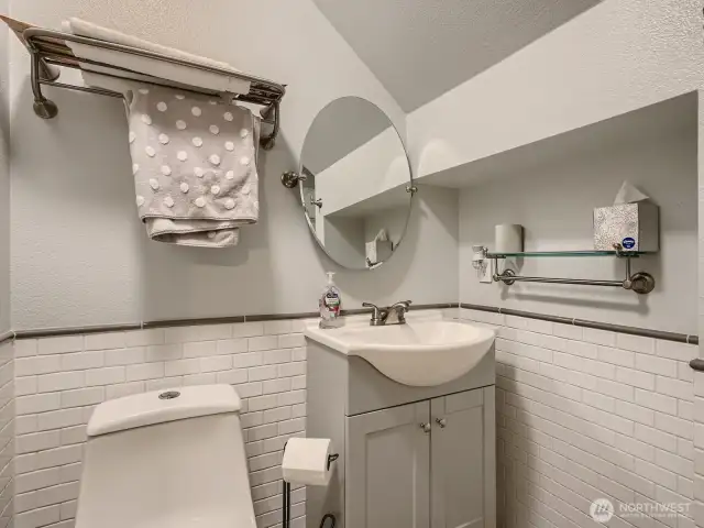 BEAUTIFULLY REMODELED MAIN FLOOR BATHROOM W/ SHOWER, NEXT TO DOWNSTAIRS BEDRM.