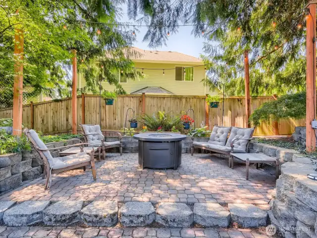 WOW! LUXURY BACK PATIO/DECK WITH FIRE PIT AND ACCENT LIGHTS IS PREFECT FOR RELAXING OUTSIDE AND BBQ.