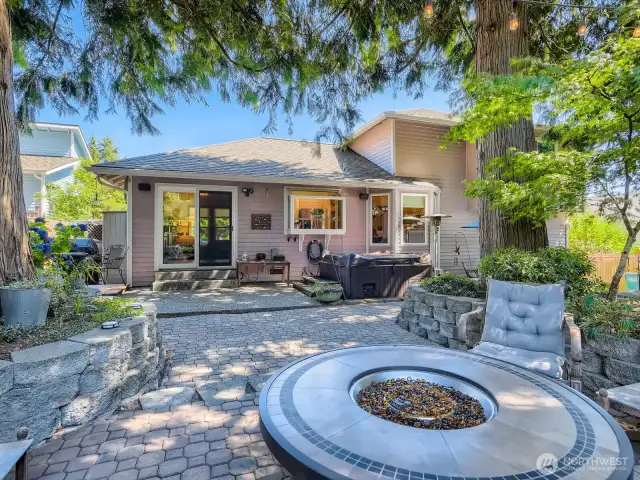 ELEGANT BACK YARD, FULLY FENCED, BEAUTIFUL LANDSCAPING AND A HOT TUB.