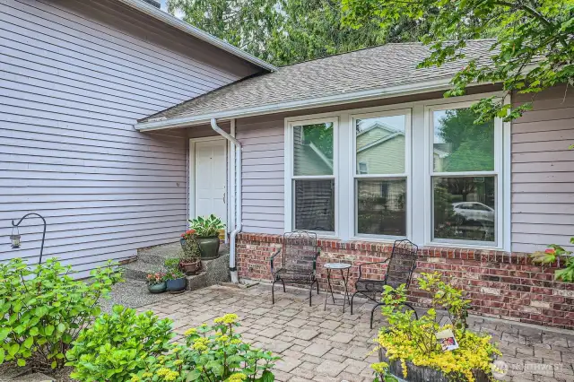 LOVELY FRONT PORCH WITH ROOM FOR FLOWER BOXES AND PATIO FURNITURE.