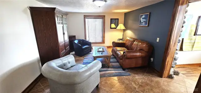 Living room with tiled floor.