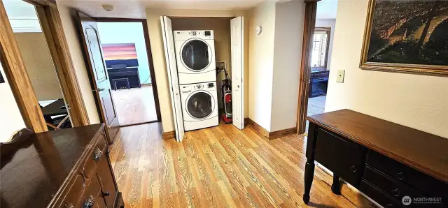 Before we go into the main bedroom, check out the stack washer/dryer. BONUS- they are included.