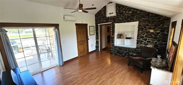 Big slider out to the patio. Current owners use this room as a den. What would you use it for?