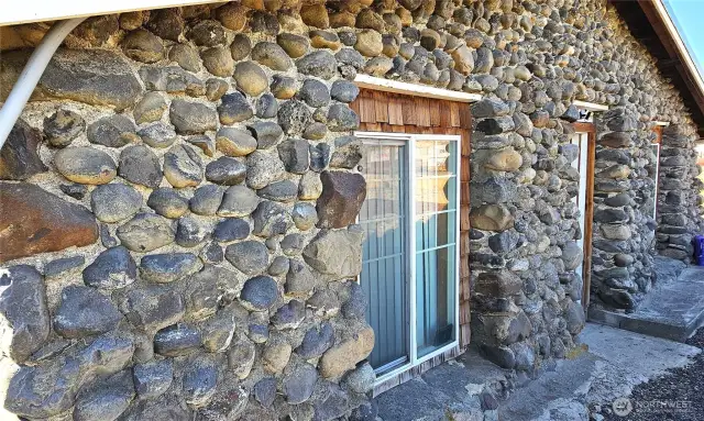 East side of house where the bedroom private entrance comes out.