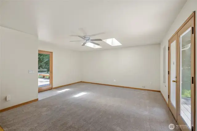 Rec room off kitchen, with doors to two deck areas!