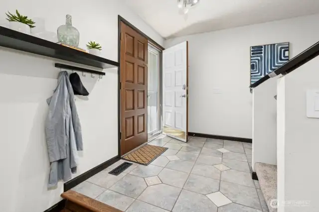 The large foyer provides plenty of room to drop your bags, shoes and coats.