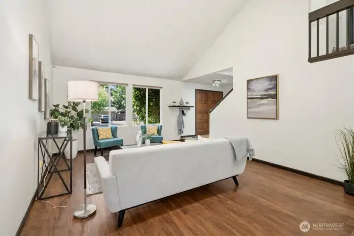 Note the lofted open hallway at upper right.