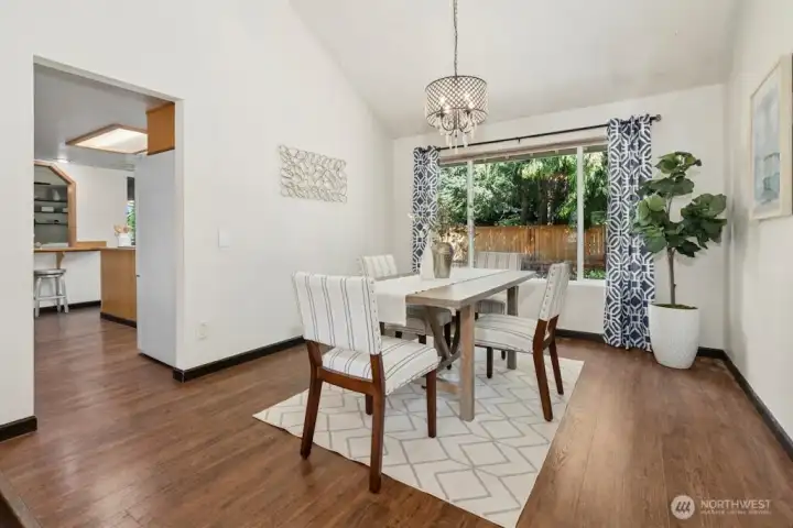 The spacious formal dining room can accommodate a large dinner party or holiday gathering.