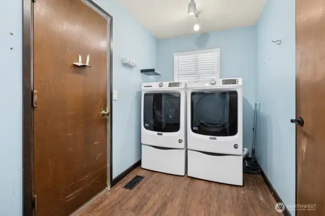 Newer Maytag washer and dryer! Door leads to the two car garage with 220 outlet for EV.