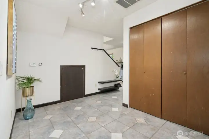 Double entry closet in foyer.