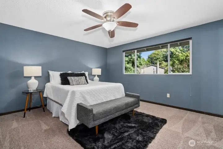 Four upper level bedrooms including this large en suite primary.