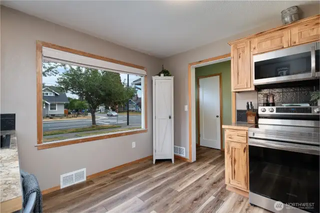 Updated kitchen featuring stainless appliances and granite countertops