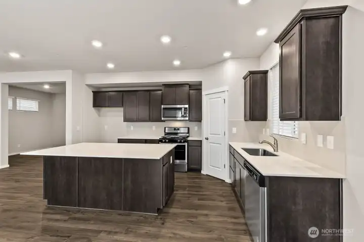 Photo is of a similar home. Colors and materials may vary.