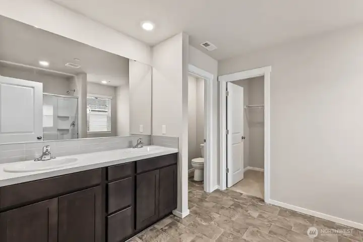 Photo is of a similar home. Colors and materials may vary.