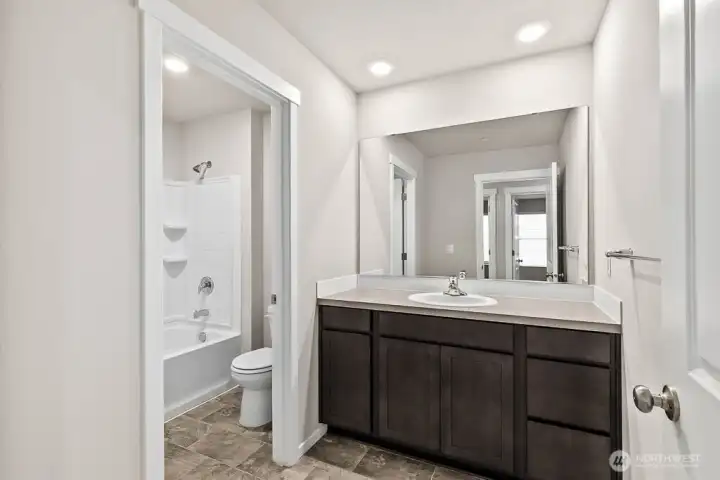 Photo is of a similar home. Colors and materials may vary.