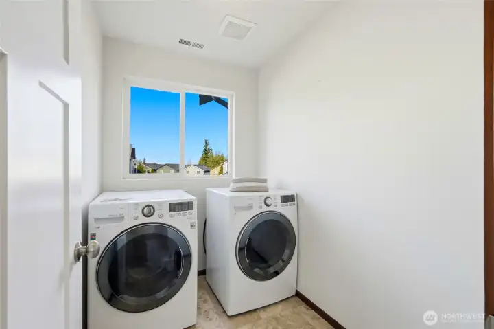Upstairs bright laundry room
