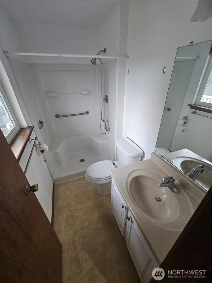 Step in shower in the en-suite bathroom.