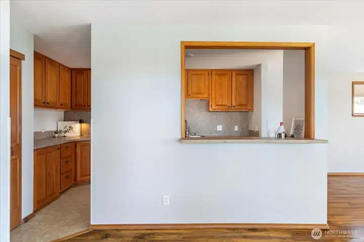 Pass-through from Kitchen to Dining - perfect for barstools and entertaining.