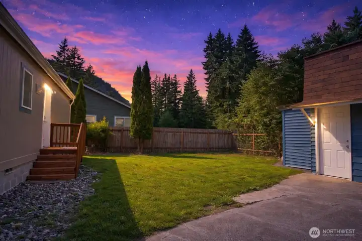 Back yard with storage shed and fenced