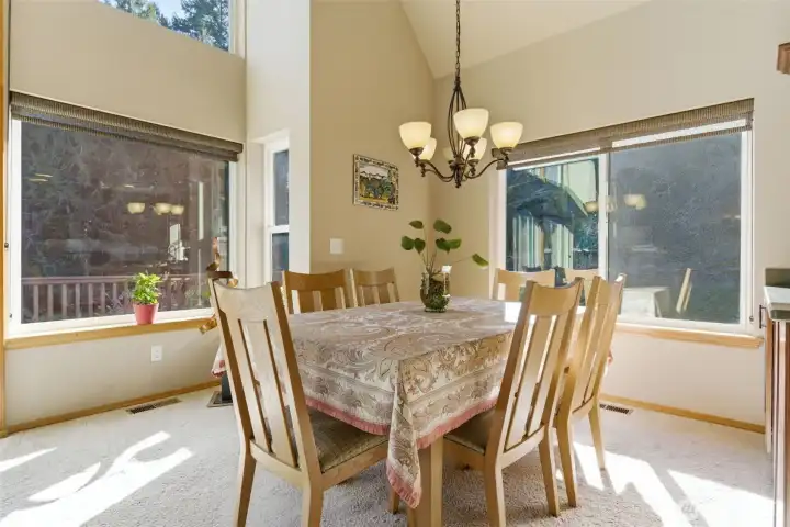 The overall feeling is expansive yet intimate — a gathering space designed for shared meals, conversation, and lingering evenings beneath high ceilings and warm light.