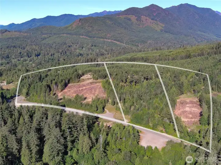 Three parcels are for sale. This information is for the parcel to the left. Miles of hiking trails to the west. Duckabush River Valley to the Left.