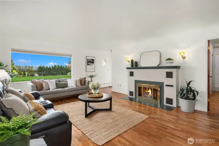 This extra large living room window allows so much natural light to flood in.