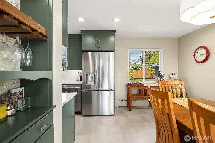 View from the second entry into the dedicated dining space that winds around to the kitchen.