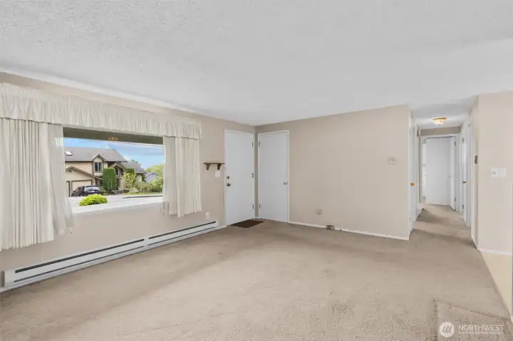Hallway Leads to 3 Bedrooms and 1 Full Bathroom