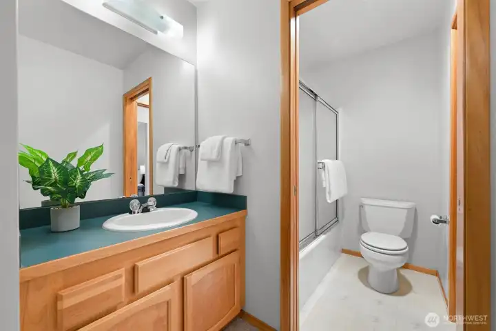 bedroom #2 vanity and shower/tub/toilet shared with bedroom #3 (jack and jill bathroom)