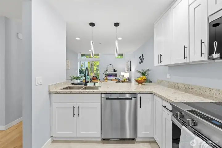 New dishwasher conveniently placed to the right of the sink.