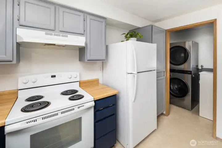 Laundry room tucked to the side of the kitchen!